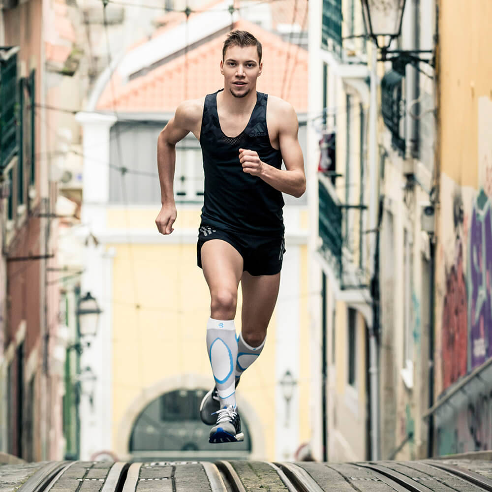 Run-Performance-Compression-Socks_running_Braeutigam-tram-Lisbon_1000x1000.jpg